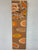 Narrow Orange Brown and Ivory Abstract Resin Wall Clock