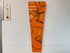 Narrow Burnt Orange Ivory and Black Abstract Resin Wall Clock