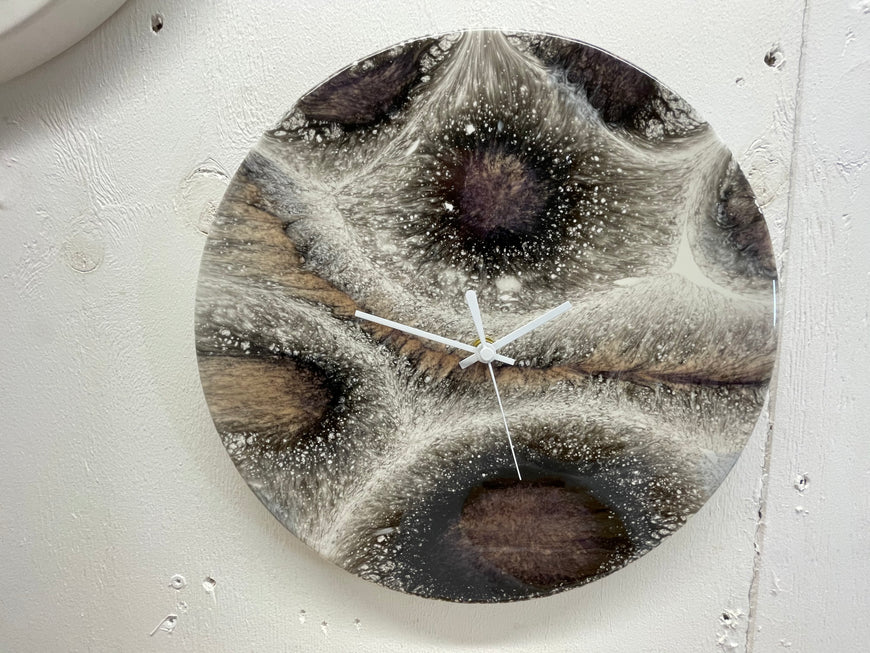 Black White and Orange Resin Wall Clock