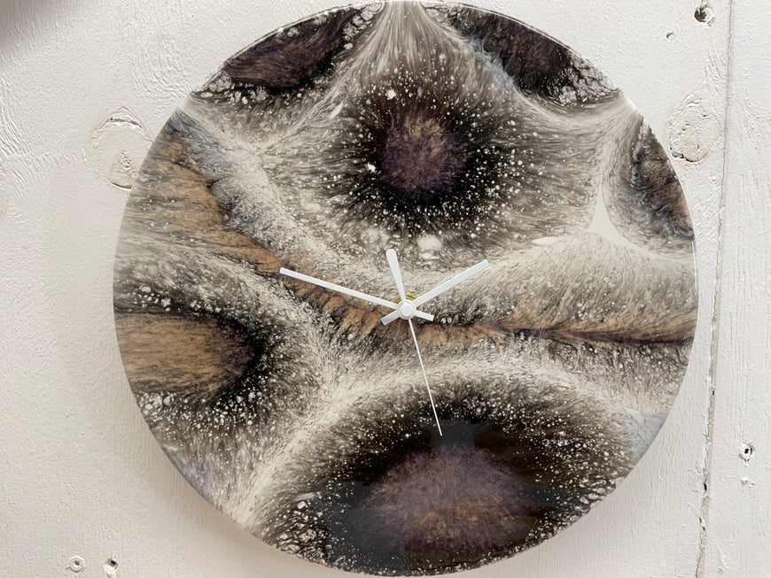 Black White and Orange Resin Wall Clock